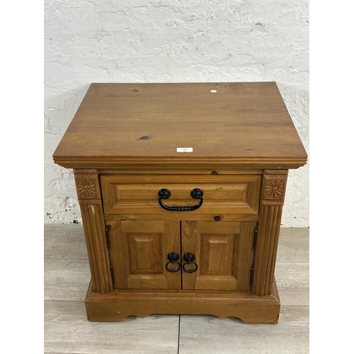 72 - A pine bedside cabinet - approx. 60cm high x 60cm wide x 48cm deep