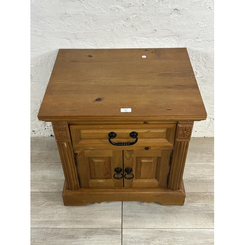 72 - A pine bedside cabinet - approx. 60cm high x 60cm wide x 48cm deep