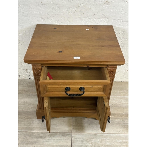 72 - A pine bedside cabinet - approx. 60cm high x 60cm wide x 48cm deep