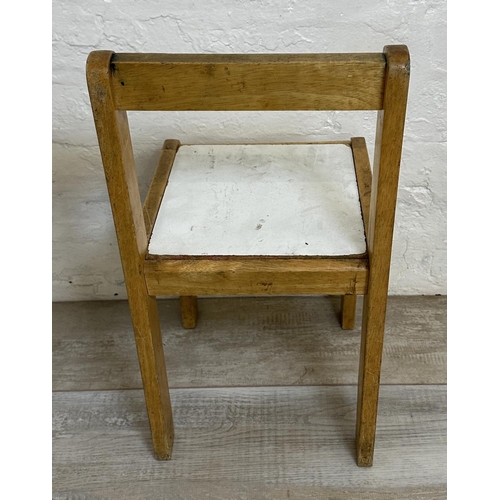 8 - A beech and white laminate child's school desk and chair - approx. 60cm high x 62cm wide x 47cm deep