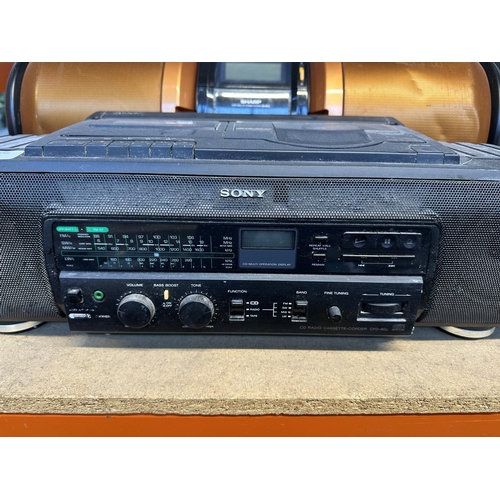 542 - Two portable stereo systems, one Sharp GX-M10 and one Sony CFD-60L