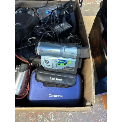 547 - A box containing Samsung camcorders