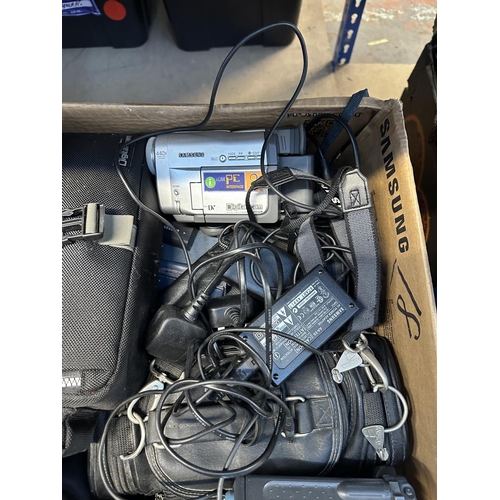 547 - A box containing Samsung camcorders