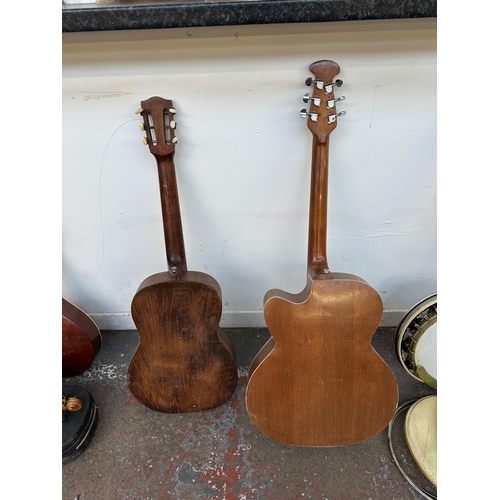 567 - Two steel strung acoustic guitars, one Bissas Enterprise MB Signature F-Hole cut away - made in Indi... 