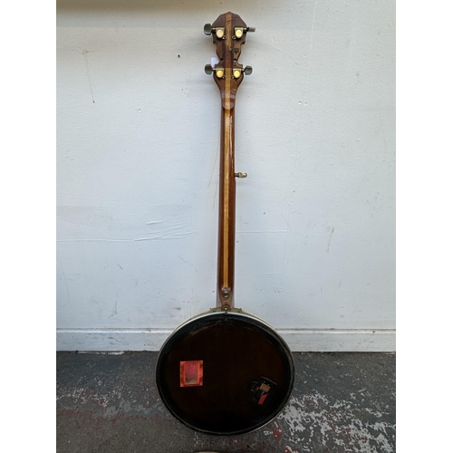 568 - A customised five-string banjo