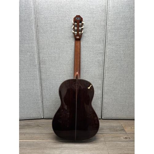 571 - A Kimbara full size nylon strung classical guitar