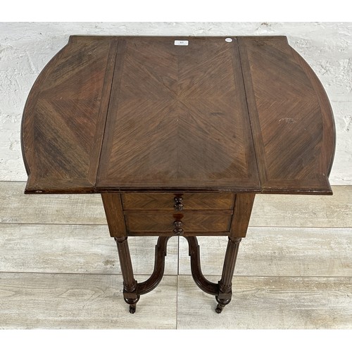 158 - An early 20th century French kingwood drop leaf work table with 