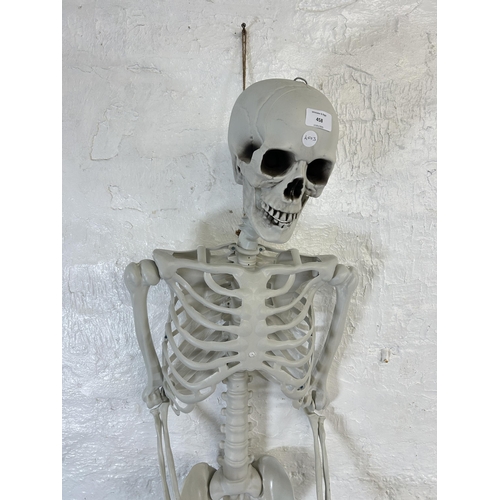 458 - A plastic model of a skeleton - approx. 166cm high