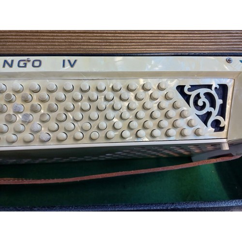 574 - A cased vintage Hohner Tango IV 120 bass piano accordion