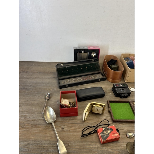 398 - A collection of items to include Recta compass, EPNS spoons, WWII Sunderland ready light, miniature ... 