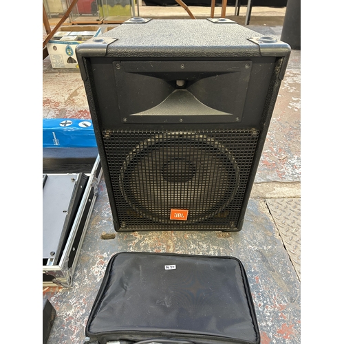 576 - A PA system comprising cased QSC Audio RMX2450 professional power amplifier, Dynamix live mix 8-2 ei... 