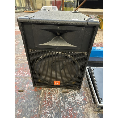 576 - A PA system comprising cased QSC Audio RMX2450 professional power amplifier, Dynamix live mix 8-2 ei... 