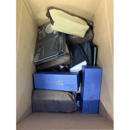 383 - A collection of men's travel items to include shoe polishing kit, grooming wallet, Emirates washbag ... 