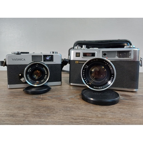 71 - Two Yashica 35mm cameras, one cased late 1960s Electro 35 G rangefinder fitted with Yashinon-DX 1:1.... 