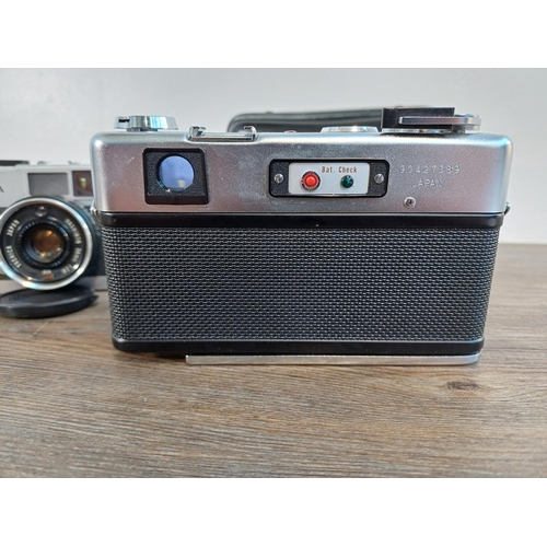 71 - Two Yashica 35mm cameras, one cased late 1960s Electro 35 G rangefinder fitted with Yashinon-DX 1:1.... 