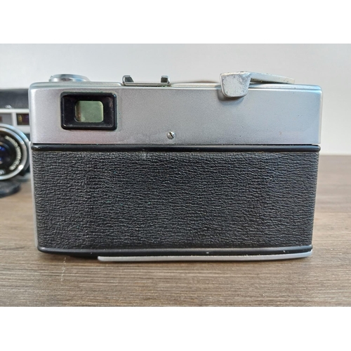 72 - Two cased Minolta Hi-Matic 35mm rangefinder cameras, one early/mid 1960s 7 fitted with Rokkor-PF 1:1... 