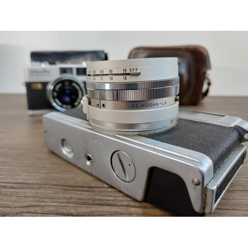 72 - Two cased Minolta Hi-Matic 35mm rangefinder cameras, one early/mid 1960s 7 fitted with Rokkor-PF 1:1... 