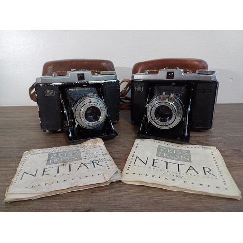 73 - Two cased 1950s Zeiss Ikon Nettar II self-erecting folding cameras for 6x6 images on 120 film with i... 