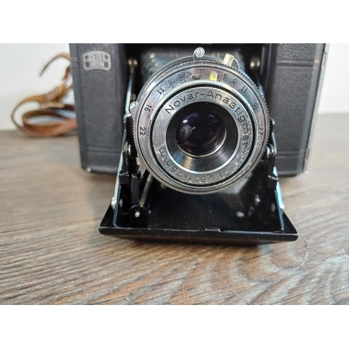 73 - Two cased 1950s Zeiss Ikon Nettar II self-erecting folding cameras for 6x6 images on 120 film with i... 