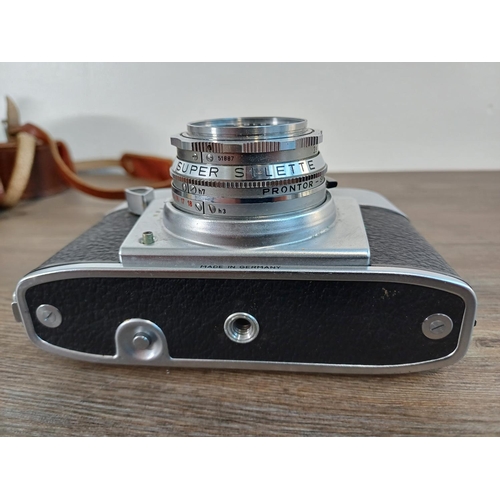 74 - A cased Agfa Super Silette fixed lens 35mm rangefinder camera fitted with Color-Apotar 1:2.8/45 lens... 