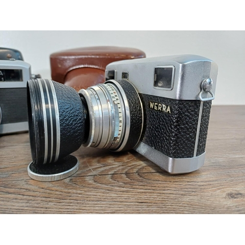 75 - Two cased 1960s Carl Zeiss Werra (curved top) 35mm cameras fitted with Carl Zeiss 2.8/50 lenses and ... 