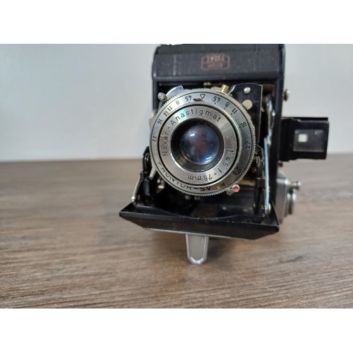 76 - Two Zeiss Ikon Ikonta folding cameras for 120 film, one 1930s 520/2 taking 6x9 images fitted with No... 