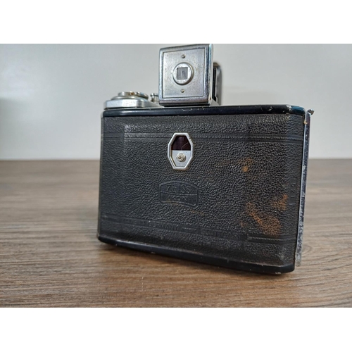 76 - Two Zeiss Ikon Ikonta folding cameras for 120 film, one 1930s 520/2 taking 6x9 images fitted with No... 