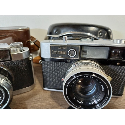 81 - Two cased Japanese 35mm rangefinder cameras, one Walz 35-S (A/F) fitted with Nitto S Kominar 1:3.5 f... 