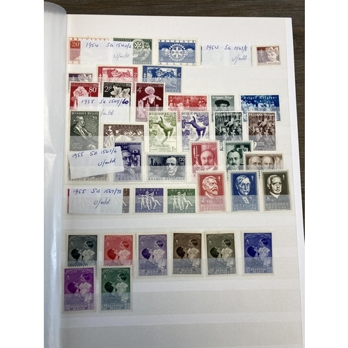 405 - Seven albums containing worldwide stamps