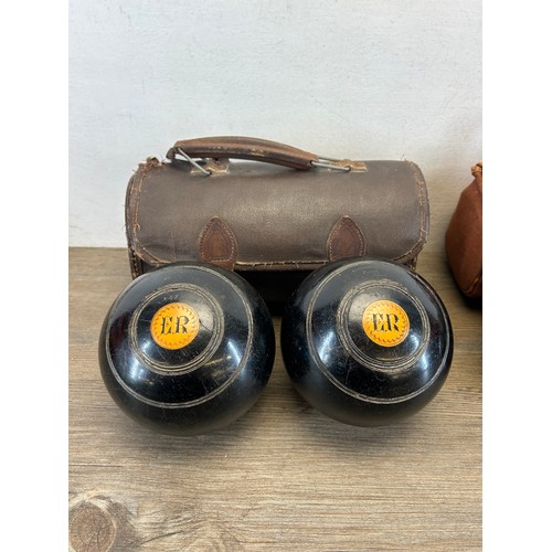 411 - Two pairs of early 20th century cased crown green bowls