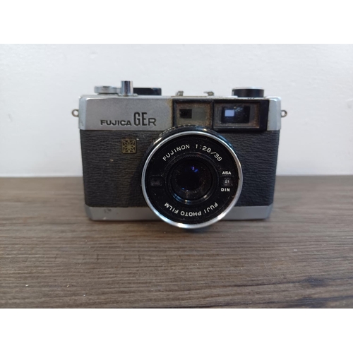 82 - Three Japanese fixed-lens compact 35mm cameras, one cased Oshiro Optical Works Emi K 35 viewfinder f... 