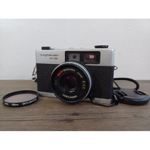 88 - A late 1970s Rollei Voigtländer VF 135 35mm rangefinder camera fitted with Color-Skoparex 2.3/40 len... 