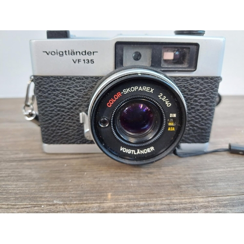 88 - A late 1970s Rollei Voigtländer VF 135 35mm rangefinder camera fitted with Color-Skoparex 2.3/40 len... 