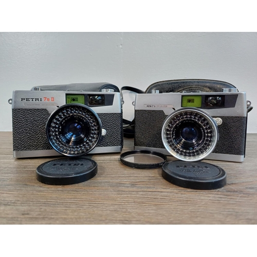 89 - Two cased Petri 35mm rangefinder cameras fitted with 2.8/45mm lenses, one 1960s 7S and one 1970s 7S ... 