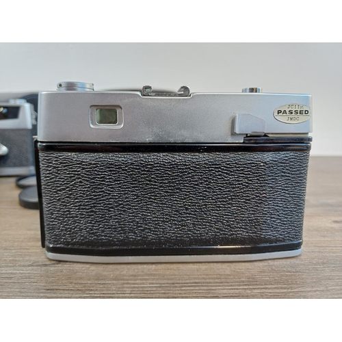 89 - Two cased Petri 35mm rangefinder cameras fitted with 2.8/45mm lenses, one 1960s 7S and one 1970s 7S ... 