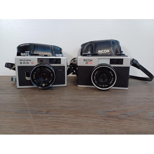 91 - Two cased Ricoh 35mm cameras fitted with Rikenon 1:2.8 f=40mm lenses, one 500 G compact coupled rang... 