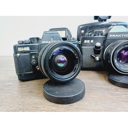 241 - Three Praktica 35mm SLR cameras and four Praktica flashes, cameras to include EE2 fitted with Pentac... 