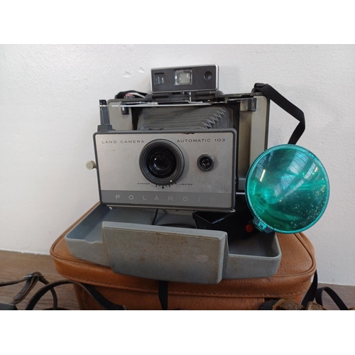 243 - Five Polaroid folding instant cameras, one cased Land Automatic 100 coupled rangefinder with accesso... 