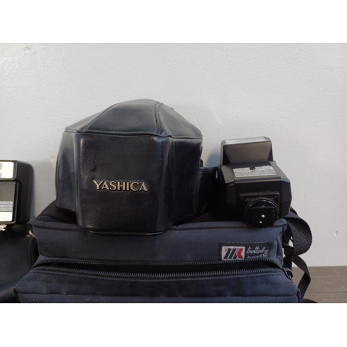 244 - A collection of Yashica items to include 200AF autofocus 35mm SLR camera fitted with 1:3.3-4.5 35-70... 