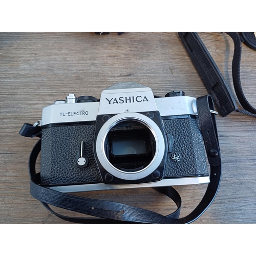 244 - A collection of Yashica items to include 200AF autofocus 35mm SLR camera fitted with 1:3.3-4.5 35-70... 