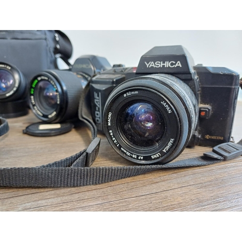 244 - A collection of Yashica items to include 200AF autofocus 35mm SLR camera fitted with 1:3.3-4.5 35-70... 