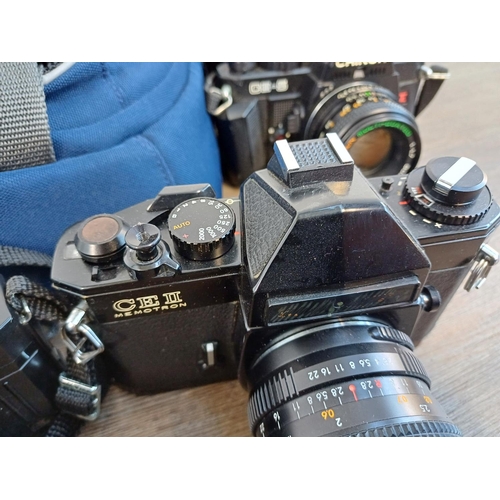 246 - Five Chinon 35mm SLR cameras, one cased CE-5 fitted with 1:1.7 50mm lens, one CP-7m fitted with 1:3.... 