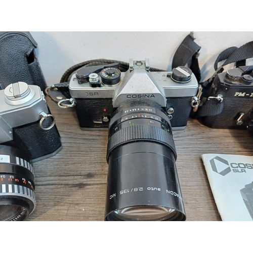 248 - Four Cosina 35mm SLR cameras, one 4000S fitted with Carl Zeiss Flektogon 2.8/35 lens, one CSR (also ... 