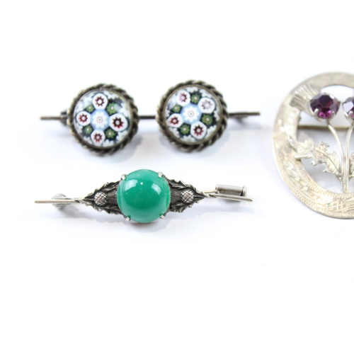 2073 - Four Scottish sterling silver brooches to include Caithness glass etc. - approx. gross weight 34g