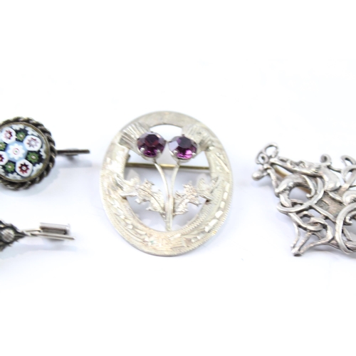 2073 - Four Scottish sterling silver brooches to include Caithness glass etc. - approx. gross weight 34g