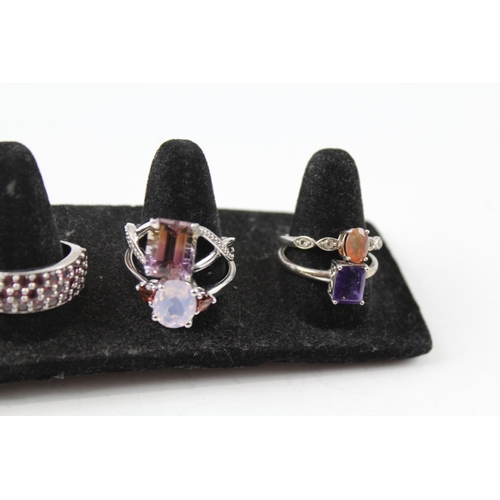 2084 - Eight sterling silver gemstone rings to include ametrine, opal etc. - approx. gross weight 29g