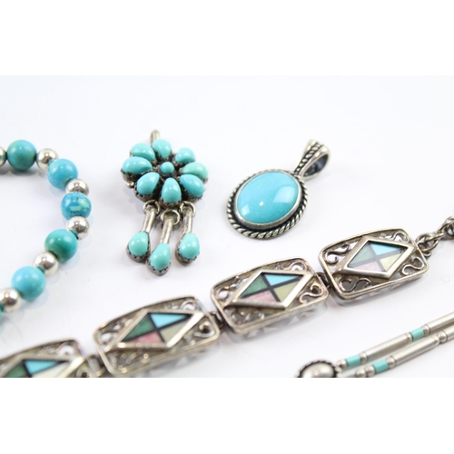 2086 - Five pieces of Native American sterling silver jewellery to include two turquoise pendants etc. - ap... 