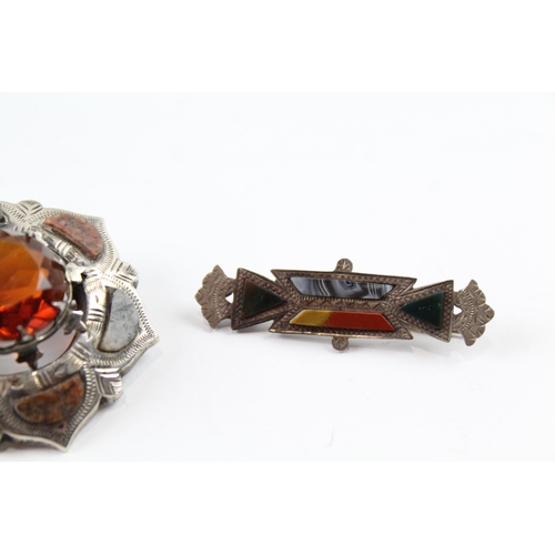 2102 - Two Scottish Revival sterling silver brooches to include hardstone etc. - approx. gross weight 18g