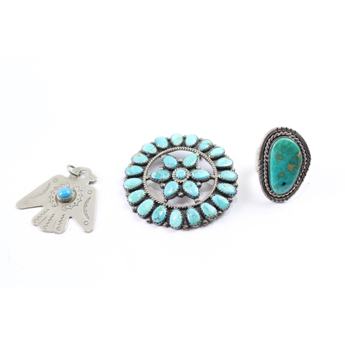 2103 - Three pieces of Native American sterling silver jewellery to include turquoise brooch etc. - approx.... 