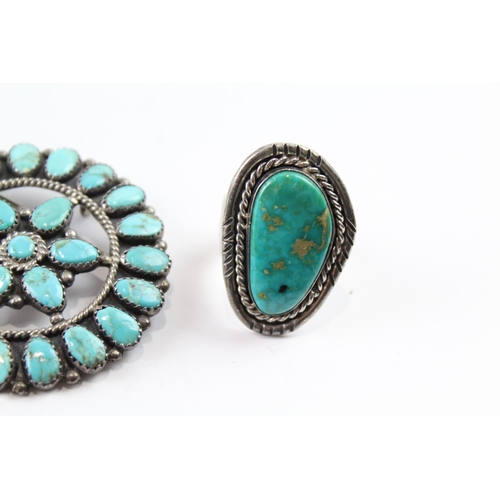 2103 - Three pieces of Native American sterling silver jewellery to include turquoise brooch etc. - approx.... 